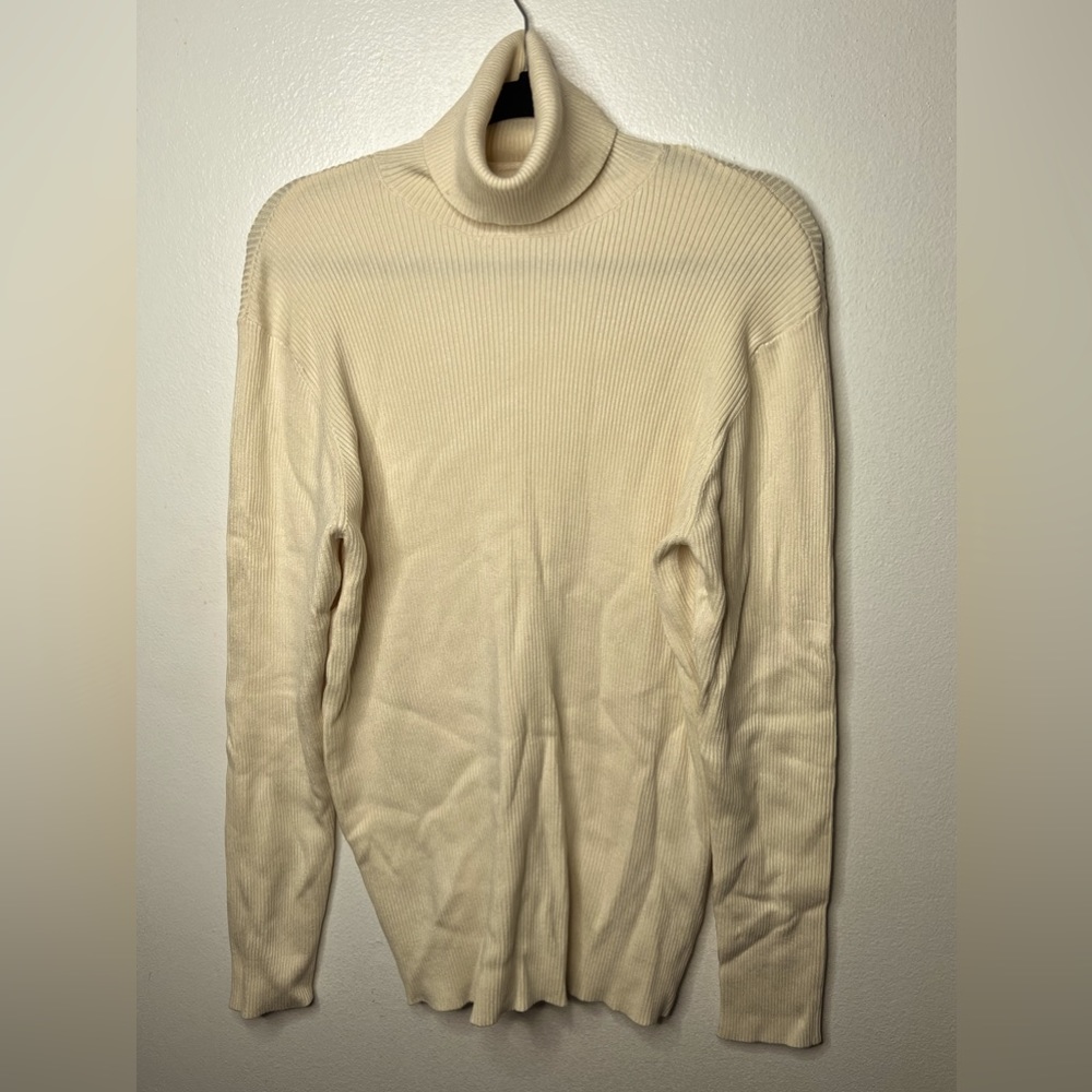 This cream colored turtleneck from the FNM collection in a size large